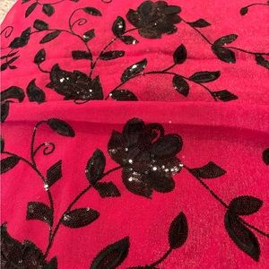 Rose pink georgette saree with black sequin roses embroidered